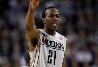 DETROIT - APRIL 04:  Stanley Robinson #21 of the Connecticut Huskies reacts while taking on the Michigan State Spartans during the National Semifinal game of the NCAA Division I Men's Basketball Championship at Ford Field on April 4, 2009 in Detroit, Michigan.  (Photo by Andy Lyons/Getty Images)