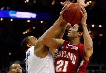 KANSAS CITY, MO - MARCH 21:  Pierre Henderson-Niles #4 of the Memphis Tigers defends a shot attempt by Greivis Vasquez #21 of the Maryland Terrapins in the first half during the second round of the NCAA Division I Men's Basketball Tournament at the Sprint Center on March 21, 2009 in Kansas City, Missouri.  (Photo by Jamie Squire/Getty Images)