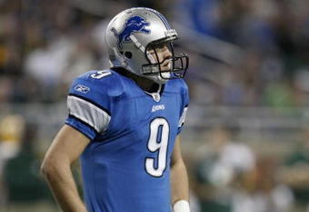 DETROIT , MI - NOVEMBER 26:  Matthew Stafford #9 of the Detroit Lions looks on while playing the Green Bay Packers on November 26, 2009 at Ford Field in Detroit, Michigan.  (Photo by Gregory Shamus/Getty Images)