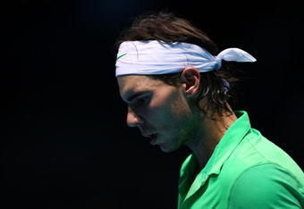 LONDON, ENGLAND - NOVEMBER 27:  Rafael Nadal of Spain reacts during the men's singles round robin match against Novak Djokovic of Serbia during the Barclays ATP World Tour Finals at the O2 Arena on November 27, 2009 in London, England.  (Photo by Clive Brunskill/Getty Images)