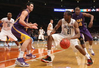 NEW YORK - NOVEMBER 25:  Stanley Robinson #21 of the Connecticut Huskies dribbles the ball against the LSU Tigers at Madison Square Garden on November 25, 2009 in New York, New York.  (Photo by Nick Laham/Getty Images)
