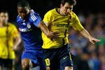 LONDON, ENGLAND - MAY 06:  Lionel Messi of Barcelona battles for the ball with Florent Malouda of Chelsea during the UEFA Champions League Semi Final Second Leg match between Chelsea and Barcelona at Stamford Bridge on May 6, 2009 in London, England.  (Photo by Clive Rose/Getty Images)