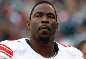 PHILADELPHIA - NOVEMBER 01:  Justin Tuck #91 of the New York Giants looks on against the Philadelphia Eagles on November 1, 2009 at Lincoln Financial Field in Philadelphia, Pennsylvania.  (Photo by Jim McIsaac/Getty Images)