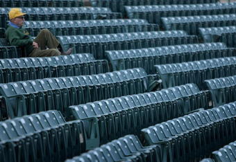 FORT COLLINS, CO - NOVEMBER 01:  A lone fan takes his seat as the Brigham Young Cougars and the Colorado State Rams take the field to warm up prior to the game at Sonny Lubick Field at Hughes Stadium on November 1, 2008 in Fort Collins, Colorado. BYU defeated CSU 45-42.  (Photo by Doug Pensinger/Getty Images)