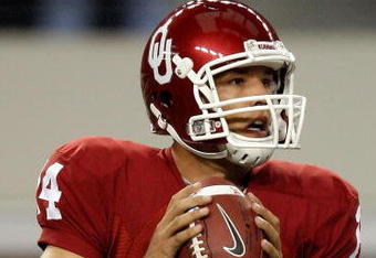 ARLINGTON, TX - SEPTEMBER 05:  Quarterback Sam Bradford #14 of the Oklahoma Sooners drops back to pass against the Brigham Young Cougars at Cowboys Stadium on September 5, 2009 in Arlington, Texas.  (Photo by Ronald Martinez/Getty Images)