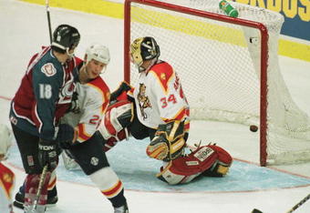 11 Jun 1996: Goaltender John Vanbiesbrouck of the Florida Panthers is beaten by a shot from Uwe Krupp of the Colorado Avalanche during triple overtime of game four of the Stanley Cup Finals at Miami Arena in Miami, Florida. The goal, the only of the game,