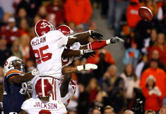 AUBURN, AL - NOVEMBER 27:  Rolando McClain #25 and Justin Woodall #27 of the Alabama Crimson Tide knock down a hail mary pass in the end zone by the Auburn Tigers at Jordan-Hare Stadium on November 27, 2009 in Auburn, Alabama.  (Photo by Kevin C. Cox/Getty Images)