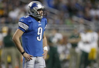 DETROIT , MI - NOVEMBER 26:  Matthew Stafford #9 of the Detroit Lions looks on while playing the Green Bay Packers on November 26, 2009 at Ford Field in Detroit, Michigan.  (Photo by Gregory Shamus/Getty Images)