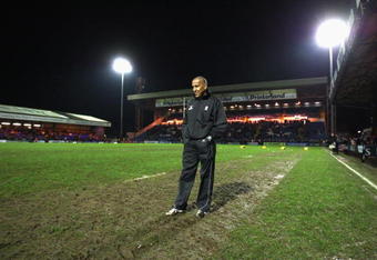STOCKPORT, ENGLAND - NOVEMBER 27:  Referee David Rose walks on the pitch after the abandonment of the Guinness Premiership match between Sale Sharks and London Wasps at Edgeley Park on November 27, 2009 in Stockport, England.  (Photo by David Rogers/Getty Images)