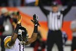 DENVER - NOVEMBER 09: Mike Wallace #17 of the Pittsburgh Steelers celebrates after scoring a touchdown in the fourth quarter against the Denver Broncos at Invesco Field at Mile High on November 09, 2009 in Denver, Colorado. (Photo by Doug Pensinger/Getty Images)