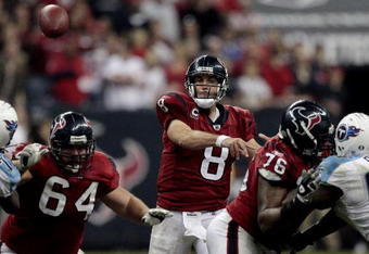 HOUSTON - NOVEMBER 23:  Quarterback Matt Schaub #8 of the Houston Texans passes over the middle as he is protected by guard Kasey Studdard #64 and tackle Duane Brown #76 at Reliant Stadium on November 23, 2009 in Houston, Texas.  (Photo by Bob Levey/Getty Images)