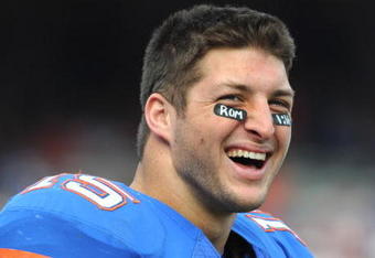 GAINESVILLE, FL - NOVEMBER 21: Quarterback Tim Tebow #15 of the Florida Gators watches fourth-quarter play against the Florida International University Golden Panthers, November 21, 2009 at Ben Hill Griffin Stadium in Gainesville, Florida.  (Photo by Al Messerschmidt/Getty Images)