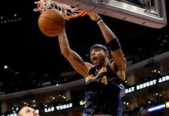 LOS ANGELES - NOVEMBER 20:  Kenyon Martin #4 of the Denver Nuggets dunks over Chris Kaman #35 of the Los Angeles Clippers on November 20, 2009 at Staples Center in Los Angeles, California.     NOTE TO USER: User expressly acknowledges and agrees that, by downloading and/or using this Photograph, user is consenting to the terms and conditions of the Getty Images License Agreement. (Photo by Stephen Dunn/Getty Images)