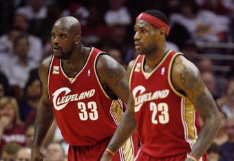 CLEVELAND - OCTOBER 27:  Shaquille O'Neal #33 and LeBron James #23 of the Cleveland Cavaliers wait on defense during the game against the Boston Celtics on October 27, 2009 at Quicken Loans Arena in Cleveland, Ohio.  The Celtics won 95-89.  NOTE TO USER: User expressly acknowledges and agrees that, by downloading and or using this photograph, User is consenting to the terms and conditions of the Getty Images License Agreement. (Photo by Gregory Shamus/Getty Images)