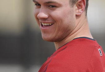 KISSIMMEE, FL - FEBRUARY 27: Koby Clemens smiles as his father, Roger Clemens, throws batting practice to the minor league team at Houston Astros Spring Training at Osceola County Stadium on February 27, 2008 in Kissimmee, Florida. The U.S. House Oversight and Government Reform Committee has asked the Justice Department to investigate whether Roger Clemens committed perjury while testifying in front of the committee.  (Photo by Scott A. Miller/Getty Images)