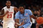NEW YORK - NOVEMBER 19:  Larry Drew II #11 of the North Carolina Tar Heels controls the ball ahead of David Lighty #23 of the Ohio State Buckeyes during their semifinal game of the 2K Sports Classic on  November 19, 2009 at Madison Square Garden in New York City.  (Photo by Jim McIsaac/Getty Images)