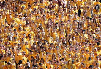 TEMPE, AZ - NOVEMBER 28:  Fans of the Arizona State Sun Devils cheer during the college football game against the Arizona Wildcats at Sun Devil Stadium on November 28, 2009 in Tempe, Arizona. The Wildcats defeated the Sun Devils 20-17. (Photo by Christian Petersen/Getty Images)