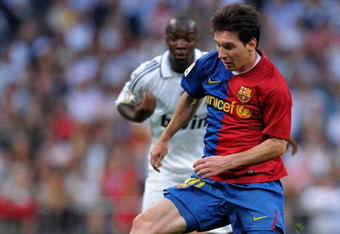 MADRID, SPAIN - MAY 02:  Lionel Messi of Barcelona controls the ball during the La Liga match between Real Madrid and Barcelona at the Santiago Bernabeu Stadium on May 2, 2009 in Madrid, Spain. Barcelona won the match 6-2.  (Photo by Jasper Juinen/Getty Images)