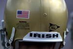 22 Sep 2001: An American flag adorns the helmuts of Notre Dame players when Notre Dame takes on Michigan State at South Bend, Indiana. DIGITAL IMAGE  Mandatory Credit: Jonathan Daniel/ALLSPORT
