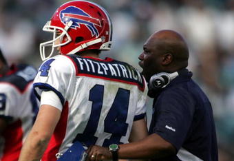 JACKSONVILLE, FL - NOVEMBER 22:  Head Coach Perry Fewell  and quarterback Ryan Fitzpatrick #14 of the Buffalo Bills watches his team  against the Jacksonville Jaguars at Jacksonville Municipal Stadium on November 22, 2009 in Jacksonville, Florida.  Jacksonville defeated Buffalo 18-15.  (Photo by Marc Serota/Getty Images)