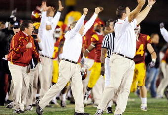 LOS ANGELES, CA - NOVEMBER 28:  Pete Carroll (C) of the USC Trojans celebrates after Damian Williams #18 wide receiver of the USC Trojans scored a 48-yard touchdown pass after UCLA Bruins called a time out with one minute remaining in the NCAA college football game at Los Angeles Memorial Coliseum on November 28, 2009 in Los Angeles, California.  (Photo by Kevork Djansezian/Getty Images)