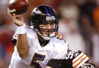 CLEVELAND - NOVEMBER 16: Joe Flacco #5 of the Baltimore Ravens attempts to throw a pass in the second quarter as he is pressured by Robaire Smith #98 of the Cleveland Browns at Cleveland Browns Stadium on November 16, 2009 in Cleveland, Ohio.  (Photo by Matt Sullivan/Getty Images)