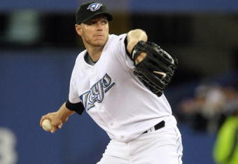 TORONTO - APRIL 6: Roy Halladay #32 of the Toronto Blue Jays delivers the pitch during the Opening Day game against the Detroit Tigers at the Rogers Centre on April 6, 2009 in Toronto, Ontario. (Photo by: Dave Sandford/Getty Images)