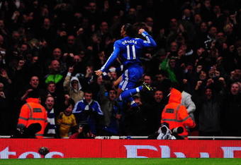 LONDON, ENGLAND - NOVEMBER 29:  Didier Drogba of Chelsea celebrates scoring his second goal during the Barclays Premier League match between Arsenal and Chelsea at the Emirates Stadium on November 29, 2009 in London, England.  (Photo by Mike Hewitt/Getty Images)