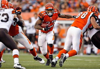 CINCINNATI - NOVEMBER 29:  Larry Johnson #27 of the Cincinnati Bengals runs with the ball  during the NFL game against the Cleveland Browns at Paul Brown Stadium on November 29, 2009 in Cincinnati, Ohio.  (Photo by Andy Lyons/Getty Images)
