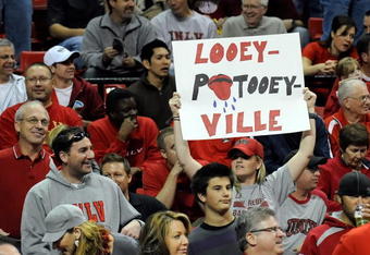 LAS VEGAS - NOVEMBER 28:  A UNLV fan holds up a sign during the team's game against the Louisville Cardinals at the Thomas & Mack Center November 28, 2009 in Las Vegas, Nevada. The Rebels defeated the Cardinals 76-71.  (Photo by Ethan Miller/Getty Images)