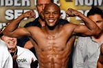 LAS VEGAS - SEPTEMBER 18:  Boxer Floyd Mayweather Jr. poses during the official weigh-in for his fight against Juan Manuel Marquez at the MGM Grand Garden Arena September 18, 2009 in Las Vegas, Nevada. The two will fight at the MGM on September 19.  (Photo by Ethan Miller/Getty Images)