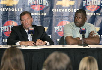 AUBURN HILLS, MI - JULY 21:  Flip Saunders (L), new Detroit Piston Head Coach, and  Piston's President Joe Dumars (R) attend a press conference at the Palace of Auburn Hills on July 21, 2005 in Auburn Hills, Michigan. Saunders, who had a 411-326 record as coach of the Minnesota Timberwolves, was hired yesterday by the Pistons to replace coach Larry Brown. NOTE TO USER: User expressly acknowledges and agrees that, by downloading and/or using this Photograph, user is consenting to the terms and conditions of the Getty Images License Agreement. Mandatory Copyright Notice: Copyright 2005 NBAE  (Photo by Bill Pugliano/Getty Images)