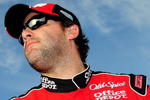 HOMESTEAD, FL - NOVEMBER 20:  Tony Stewart, driver of the #14 Office Depot/Old Spice Chevrolet, stands on the grid during qualifying for the NASCAR Sprint Cup Series Ford 400 at Homestead-Miami Speedway on November 20, 2009 in Homestead, Florida.  (Photo by Sam Greenwood/Getty Images)