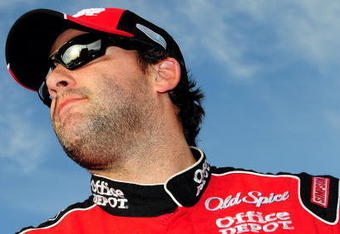 HOMESTEAD, FL - NOVEMBER 20:  Tony Stewart, driver of the #14 Office Depot/Old Spice Chevrolet, stands on the grid during qualifying for the NASCAR Sprint Cup Series Ford 400 at Homestead-Miami Speedway on November 20, 2009 in Homestead, Florida.  (Photo by Sam Greenwood/Getty Images)