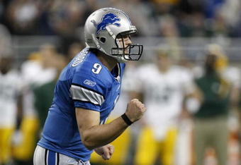 DETROIT , MI - NOVEMBER 26:  Matthew Stafford #9 of the Detroit Lions reacts after throwing a first quarter touchdown while playing the Green Bay Packers on November 26, 2009 at Ford Field in Detroit, Michigan.  (Photo by Gregory Shamus/Getty Images)
