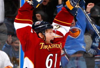 ATLANTA - NOVEMBER 19:  Maxim Afinogenov #61 of the Atlanta Thrashers reacts after scoring a goal to tie the game against the Boston Bruins in the final minutes of regulation at Philips Arena on November 19, 2009 in Atlanta, Georgia.  (Photo by Kevin C. Cox/Getty Images)