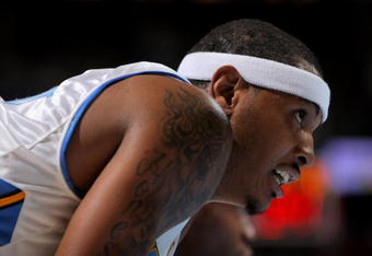 DENVER - OCTOBER 28:  Carmelo Anthony #15 of the Denver Nuggets looks on while awaiting a free throw against the Utah Jazz during NBA action at Pepsi Center on October 28, 2009 in Denver, Colorado. The Nuggets defeated the Jazz 114-105.  (Photo by Doug Pensinger/Getty Images)