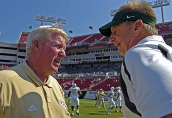 TAMPA, FL - OCTOBER 13: Coach George O'Leary (left) of the University of Central Florida Knights and coach Jim Leavitt of the South Florida Bulls meet at mid-field before play at Raymond James Stadium on October 13, 2007 in Tampa, Florida.  The fifth-ranked  Bulls won 64 - 12.(Photo by Al Messerschmidt/Getty Images)