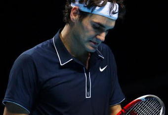 LONDON, ENGLAND - NOVEMBER 28:  Roger Federer of Switzerland reacts during the men's singles semi final match against Nikolay Davydenko of Russia during the Barclays ATP World Tour Finals at the O2 Arena on November 28, 2009 in London, England.  (Photo by Julian Finney/Getty Images)