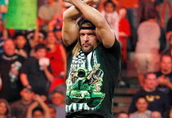 LAS VEGAS - AUGUST 24:  Wrestler Triple H gestures to the crowd during the WWE Monday Night Raw show at the Thomas & Mack Center August 24, 2009 in Las Vegas, Nevada.  (Photo by Ethan Miller/Getty Images)