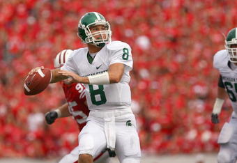 MADISON, WI - SEPTEMBER 26: Kirk Cousins #8 of the Michigan State Spartans looks to pass the ball against the Wisconsin Badgers on September 26, 2009 at Camp Randall Stadium in Madison, Wisconsin. (Photo by Jonathan Daniel/Getty Images)