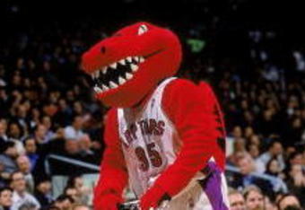 16 Nov 2000:  The Toronto Raptors mascot rides a scooter down the sidelines during the game against the Portland Trail Blazers at the Air Canada Center in Toronto, Canada. The Blazers defeated the Raptors 86-80. NOTE TO USER: It is expressly understood that the only rights Allsport are offering to license in this Photograph are one-time, non-exclusive editorial rights. No advertising or commercial uses of any kind may be made of Allsport photos. User acknowledges that it is aware that Allsport is an editorial sports agency and that NO RELEASES OF ANY TYPE ARE OBTAINED from the subjects contained in the photographs.Mandatory Credit: Robert Skeoch  /Allsport