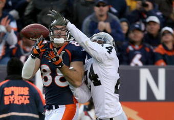 DENVER - NOVEMBER 23:  Tight end Tony Scheffler #88 of the Denver Broncos is unable to make a reception as Michael Huff #24 of the Oakland Raiders defends during week 12 NFL action at Invesco Field at Mile High on November 23, 2008 in Denver, Colorado. The Raiders defeated the Broncos 31-10.  (Photo by Doug Pensinger/Getty Images)