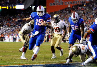 GAINESVILLE, FL - NOVEMBER 28:  Tim Tebow #15 of the Florida Gators runs for a touchdown during the game against the Florida State Seminoles at Ben Hill Griffin Stadium on November 28, 2009 in Gainesville, Florida.  (Photo by Sam Greenwood/Getty Images)