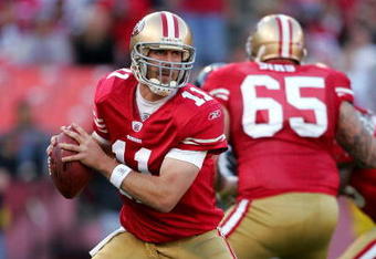 SAN FRANCISCO - NOVEMBER 29: Alex Smith #11 of the San Francisco 49ers drops back to pass during their game against the Jacksonville Jaguars at Candlestick Park on November 29, 2009 in San Francisco, California.  (Photo by Ezra Shaw/Getty Images)