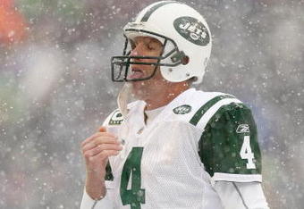 SEATTLE - DECEMBER 21:  Quarterback Brett Favre #4 of the New York Jets tastes some snow during the game against the Seattle Seahawks on December 21, 2008 at Qwest Field in Seattle, Washington. The Seahawks defeated the Jets 13-3. (Photo by Otto Greule Jr/Getty Images)