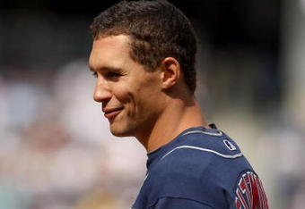 NEW YORK - APRIL 19:  Grady Sizemore #24 of the Cleveland Indians stands on first base after getting a hit during their game against the New York Yankees at Yankee Stadium on April 19, 2009 in the Bronx borough of New York City.  (Photo by Ezra Shaw/Getty Images)