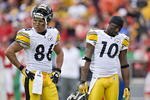 KANSAS CITY, MO - NOVEMBER 22:  Wide receivers Hines Ward #86 and Mike Wallace #10 of the Pittsburgh Steelers stand on the field together during NFL action against the Kansas City Chiefs at Arrowhead Stadium on November 22, 2009 in Kansas City, Missouri.  The Chiefs defeated the Steelers 27-24.  (Photo by Wesley Hitt/Getty Images)