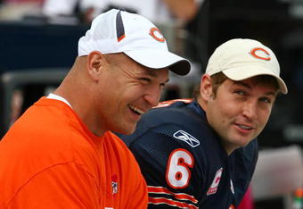 CHICAGO - OCTOBER 04: Injured linebacker Brian Urlacher of the Chicago Bears shares a laugh with Jay Cutler #6 on the bench during a game against the Detroit Lions on October 4, 2009 at Soldier Field in Chicago, Illinois. The Bears defeated the Lions 48-24.  (Photo by Jonathan Daniel/Getty Images)