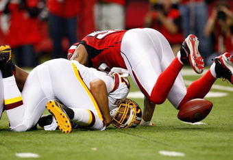ATLANTA - NOVEMBER 08:  John Abraham #55 of the Atlanta Falcons sacks quarterback Jason Campbell #17 of the Washington Redskins at Georgia Dome on November 8, 2009 in Atlanta, Georgia.  (Photo by Kevin C. Cox/Getty Images)